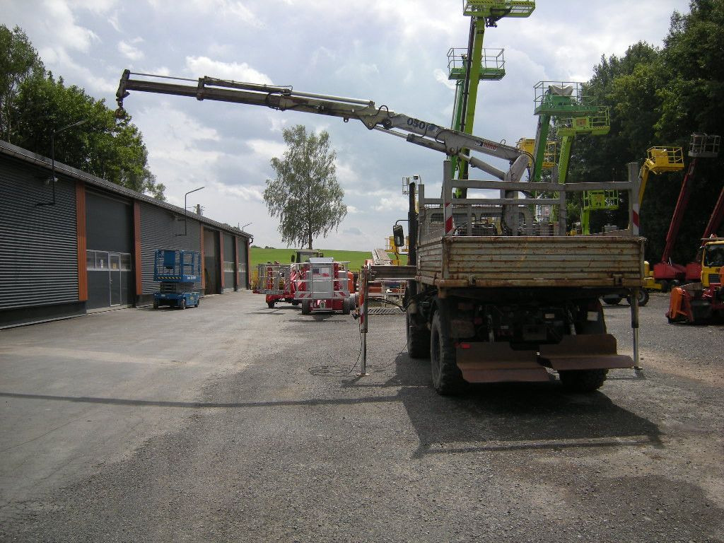Mercedes-Benz Unimog U1250 mit Kran MKG 105 - Carrinha basculante: foto 4 Mercedes-Benz Unimog U1250 mit Kran MKG 105 - Carrinha basculante: foto 4