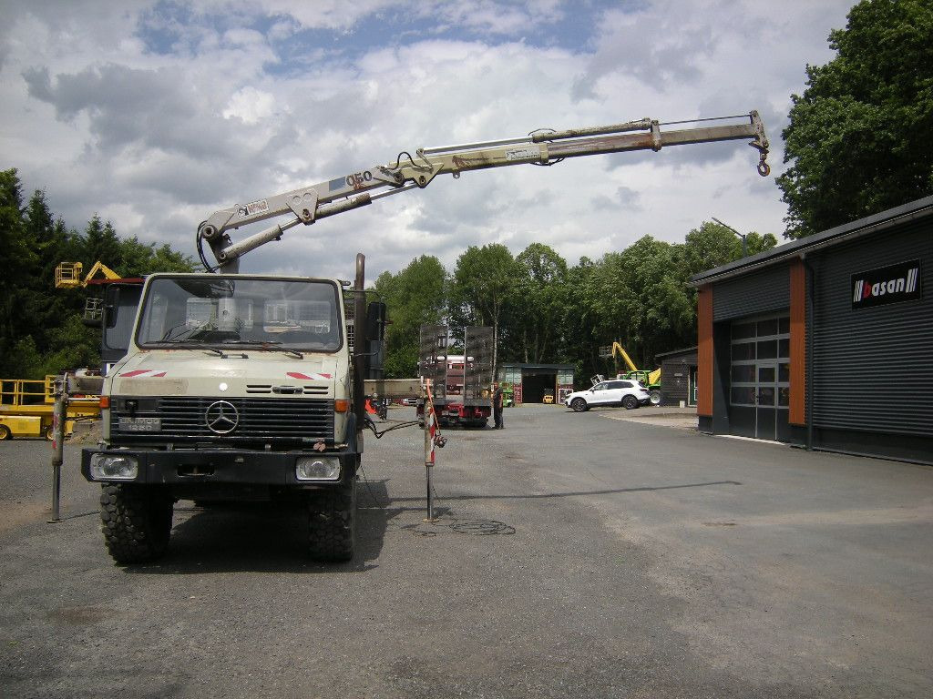 Mercedes-Benz Unimog U1250 mit Kran MKG 105 - Carrinha basculante: foto 1 Mercedes-Benz Unimog U1250 mit Kran MKG 105 - Carrinha basculante: foto 1
