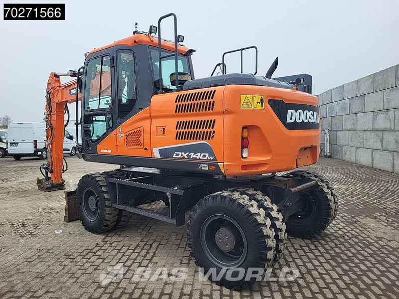 Doosan DX140 W-5 OIL QUICK - GERMAN - Escavadeira de rodas: foto 2 Doosan DX140 W-5 OIL QUICK - GERMAN - Escavadeira de rodas: foto 2