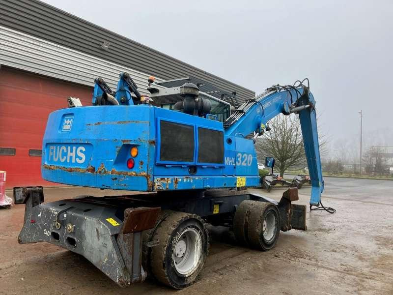 Fuchs MHL 320 - Manipulador de material: foto 3 Fuchs MHL 320 - Manipulador de material: foto 3
