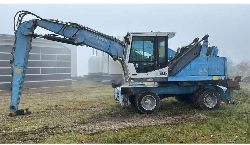 Fuchs MHL320 - Manipulador de material: foto 1 Fuchs MHL320 - Manipulador de material: foto 1