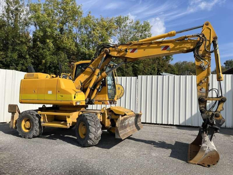 Volvo Pelle sur Pneus EW140D - Escavadeira de rodas: foto 1 Volvo Pelle sur Pneus EW140D - Escavadeira de rodas: foto 1