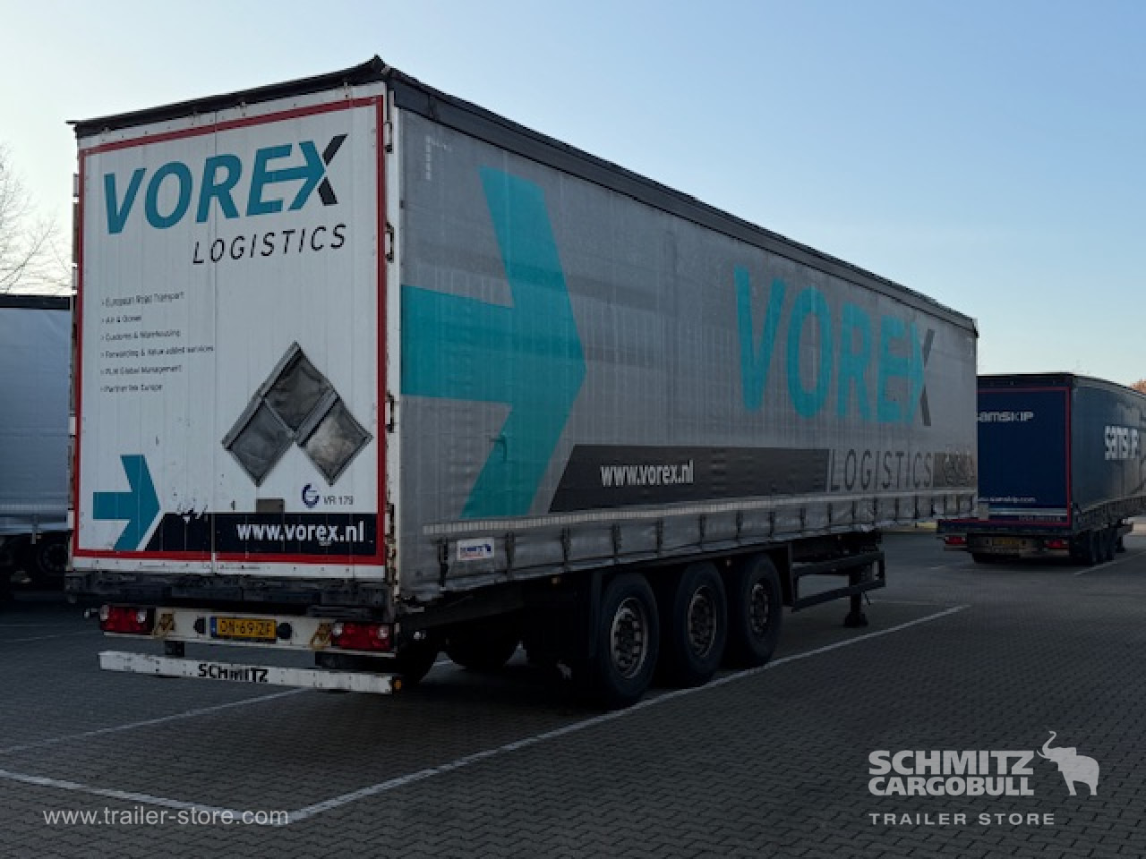 SCHMITZ Oplegger Schuifzeil Standard - Semi-reboque de lona: foto 1 SCHMITZ Oplegger Schuifzeil Standard - Semi-reboque de lona: foto 1