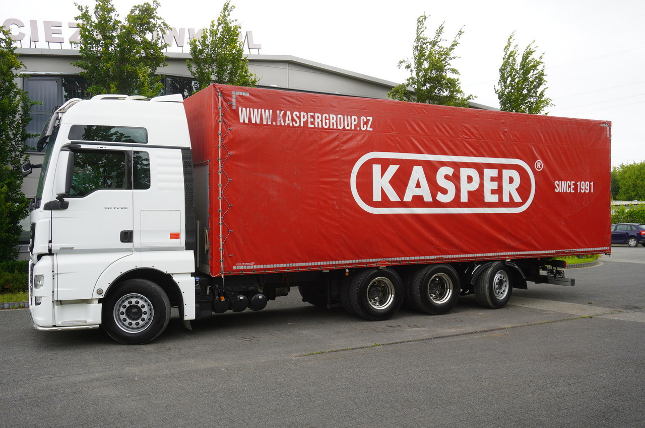 MAN MAN TGX 35.580 E6 8x4 /4 / 23 EPAL tarp superstructure / 4th axle steered - Camião de lona: foto 2 MAN MAN TGX 35.580 E6 8x4 /4 / 23 EPAL tarp superstructure / 4th axle steered - Camião de lona: foto 2