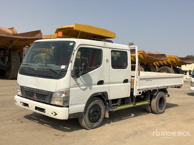 2012 Mitsubishi Canter 4x2 Crew Cab Flatbed Truck - Camião de caixa aberta/ Plataforma: foto 2 2012 Mitsubishi Canter 4x2 Crew Cab Flatbed Truck - Camião de caixa aberta/ Plataforma: foto 2