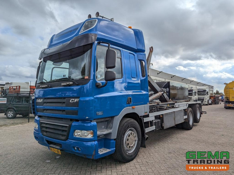 DAF FAS CF85.410 6x2 Euro5 FAS CF85.410 6x2 Spacecab Euro5 - HaakarmSysteem AJK 20T - KlapBumper - Vangmuilkoppeling - Lift-As - Camião polibenne: foto 1 DAF FAS CF85.410 6x2 Euro5 FAS CF85.410 6x2 Spacecab Euro5 - HaakarmSysteem AJK 20T - KlapBumper - Vangmuilkoppeling - Lift-As - Camião polibenne: foto 1