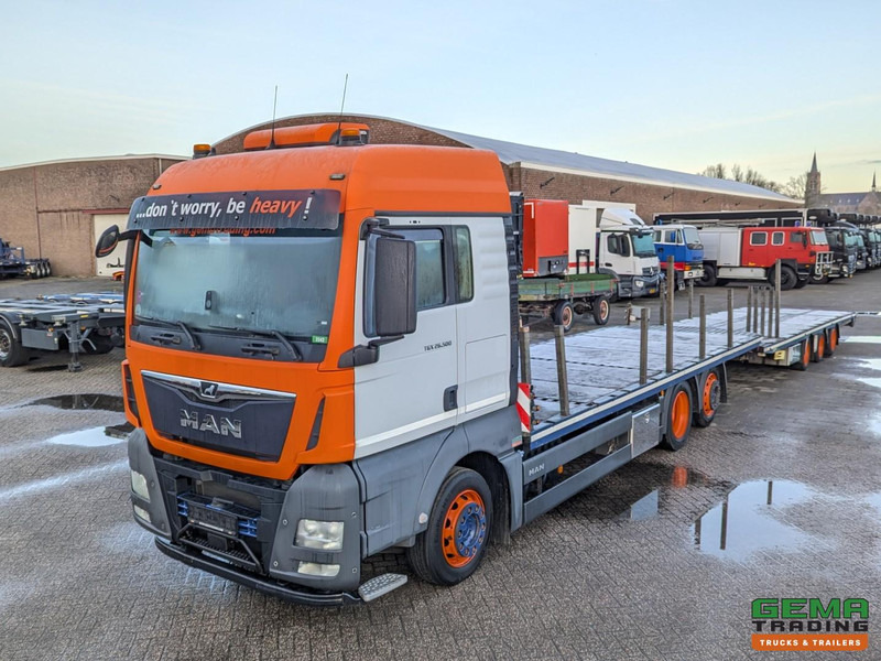 MAN TGX 26.500 6x2/4 LL Euro6 - Retarder + Recker FZ3 3-Assige Aanhanger - Uitschuifbaar - Camião transporte de veículos: foto 1 MAN TGX 26.500 6x2/4 LL Euro6 - Retarder + Recker FZ3 3-Assige Aanhanger - Uitschuifbaar - Camião transporte de veículos: foto 1