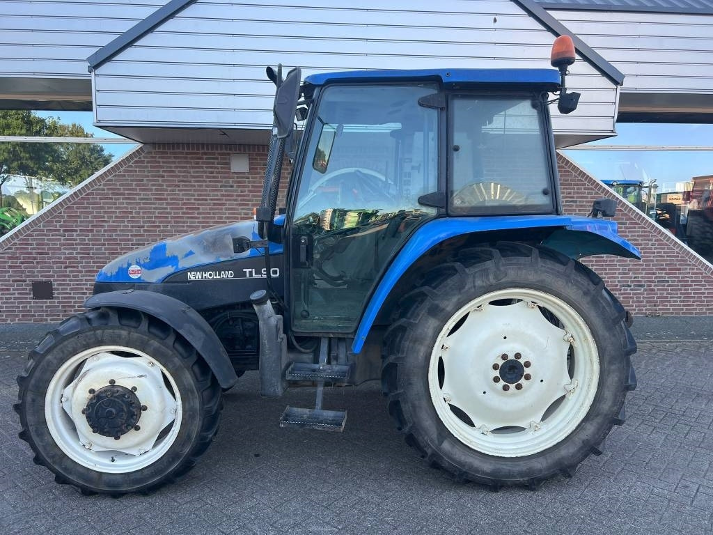 New Holland TL 90 - Trator: foto 2 New Holland TL 90 - Trator: foto 2
