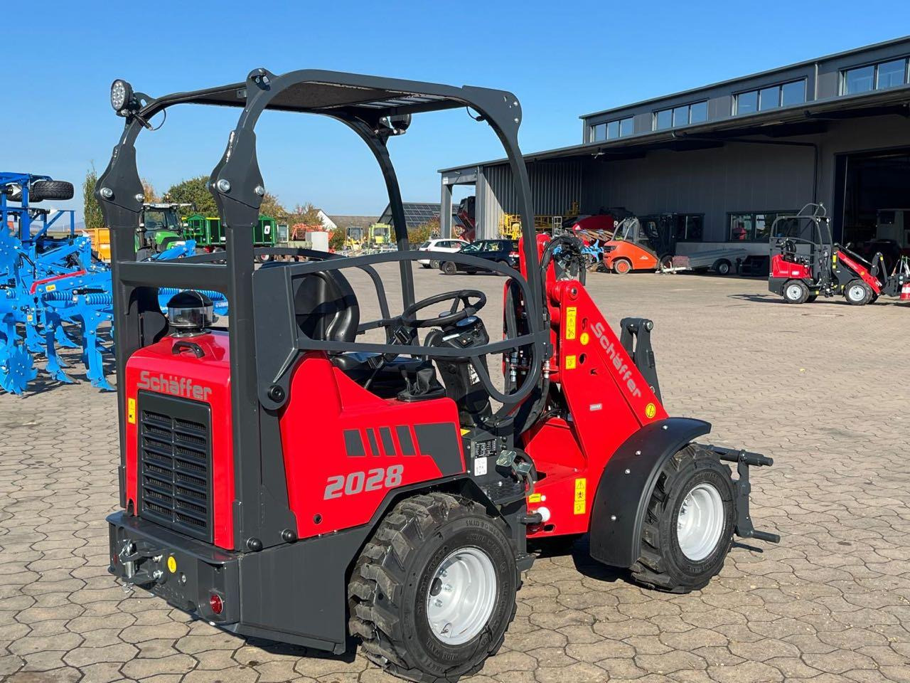Schäffer 2028 - Pá carregadora de rodas: foto 2 Schäffer 2028 - Pá carregadora de rodas: foto 2