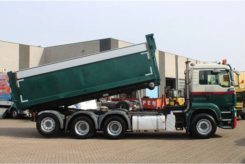 MAN TGA 35.400 8X4 + MANUAL! + NCH kipper/ bitum sprayer - Camião com sistema de cabo: foto 4 MAN TGA 35.400 8X4 + MANUAL! + NCH kipper/ bitum sprayer - Camião com sistema de cabo: foto 4