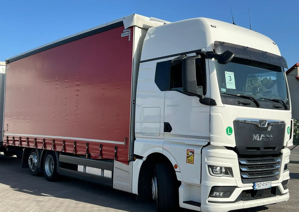 MAN TGX 26.470 z przyczepą Redos - Camião de lona, Reboque de lona: foto 3 MAN TGX 26.470 z przyczepą Redos - Camião de lona, Reboque de lona: foto 3