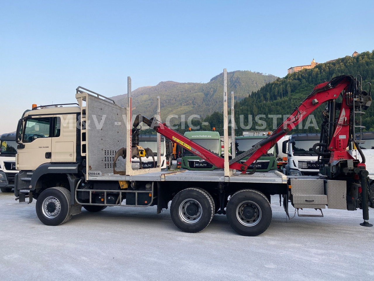 Camião de transporte de madeira, Camião grua MAN 33.500 6X6 mit Kran PENZ 12Z: foto 13