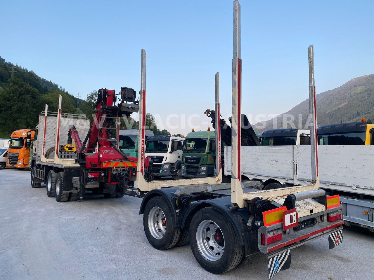 Camião de transporte de madeira, Camião grua MAN 33.500 6X6 mit Kran PENZ 12Z: foto 14