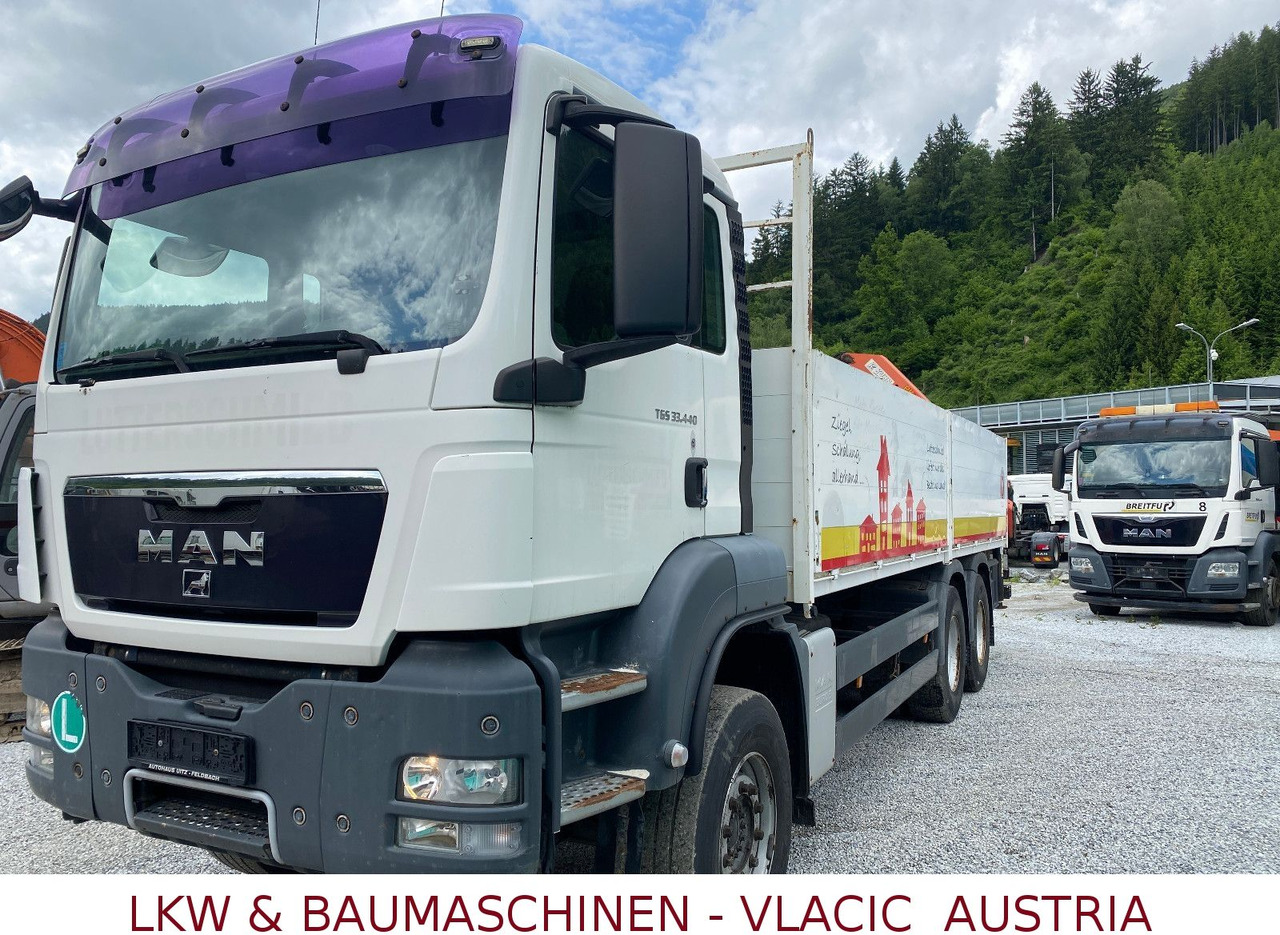 MAN TGS 33.440 6x4 Blatt/Blatt Mit Palfinger PK16500 - Camião de caixa aberta/ Plataforma, Camião grua: foto 1 MAN TGS 33.440 6x4 Blatt/Blatt Mit Palfinger PK16500 - Camião de caixa aberta/ Plataforma, Camião grua: foto 1