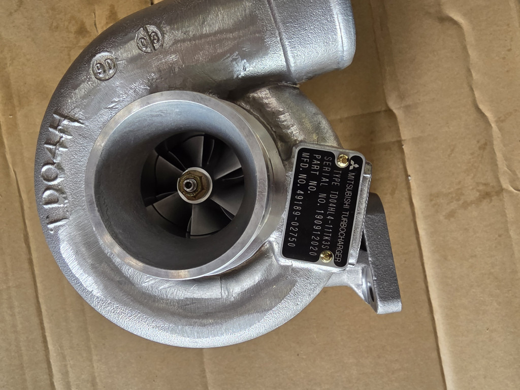 New Holland va4918902750 - Turbocompressor por Máquina de construção: foto 1 New Holland va4918902750 - Turbocompressor por Máquina de construção: foto 1