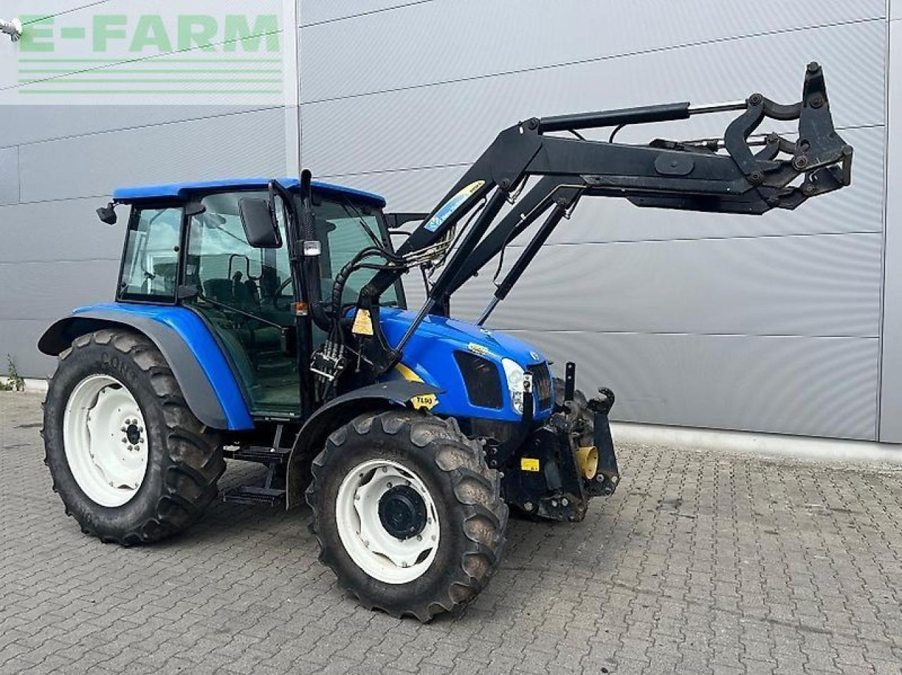 New Holland tl 90 a A - Trator: foto 1 New Holland tl 90 a A - Trator: foto 1