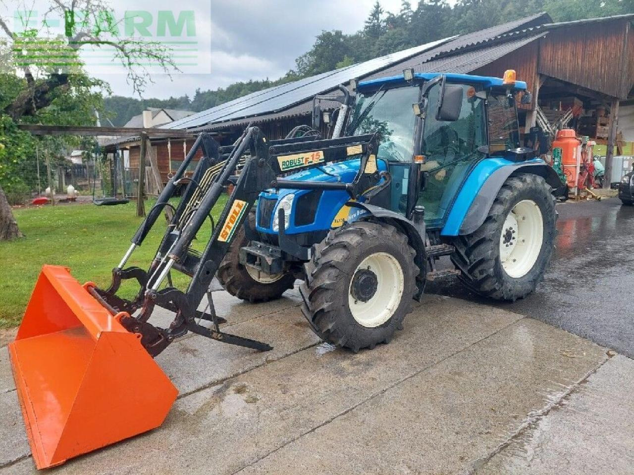 New Holland tl 90 a A - Trator: foto 1 New Holland tl 90 a A - Trator: foto 1