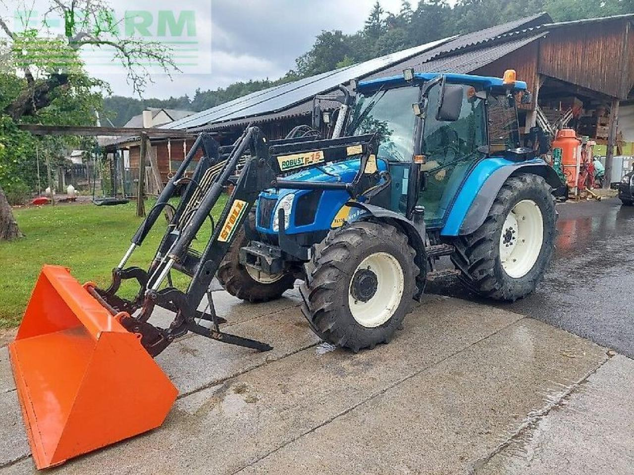New Holland tl 90 a A - Trator: foto 1 New Holland tl 90 a A - Trator: foto 1