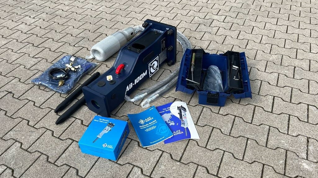 Hydraulikhammer AJCE 100M ohne Aufnahme - Martelo hidráulico por Máquina de construção: foto 1 Hydraulikhammer AJCE 100M ohne Aufnahme - Martelo hidráulico por Máquina de construção: foto 1