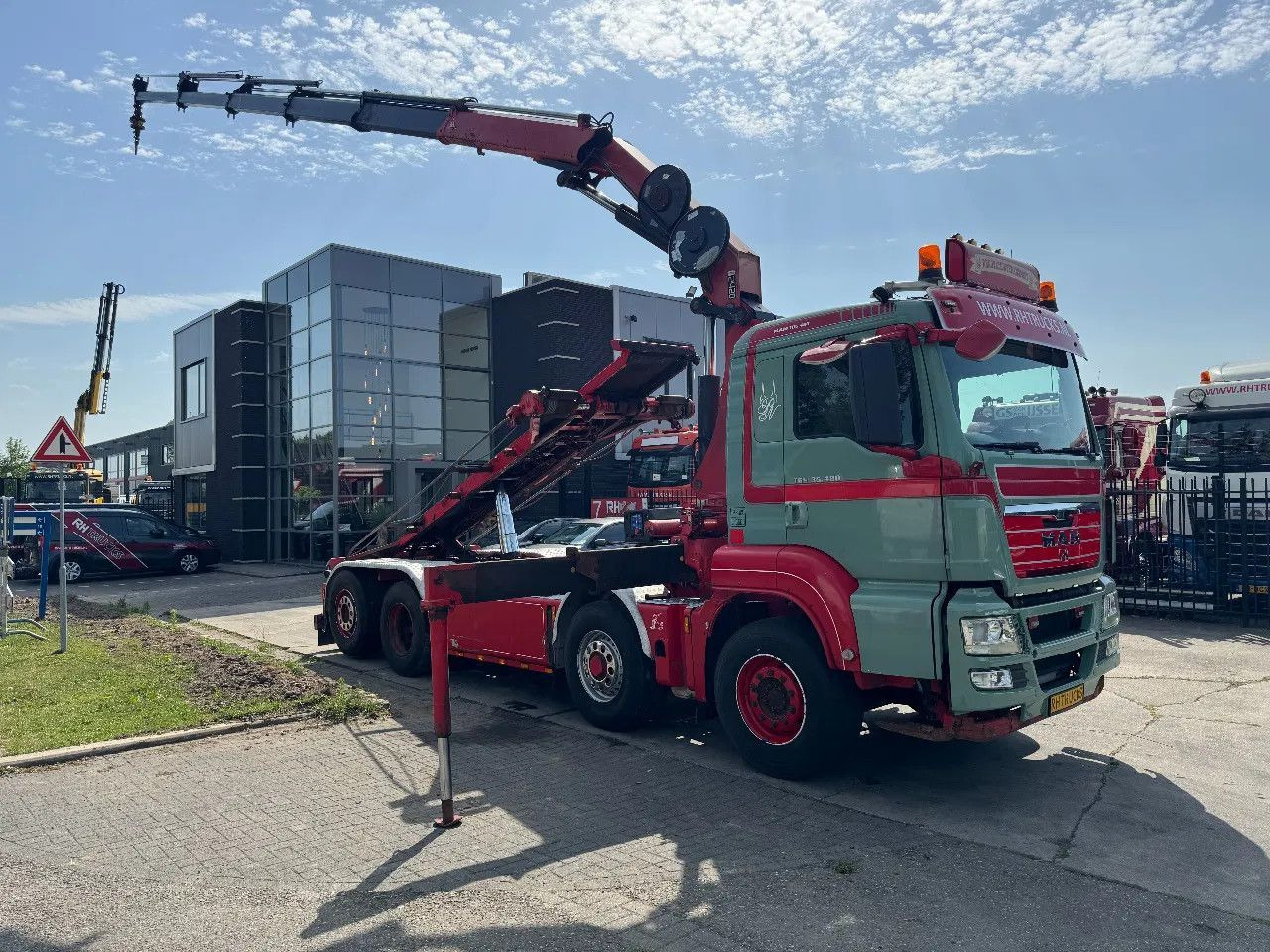 MAN TGS 35.480 8X4 HMF 2420 K5 + HMF ABLE + REMOTE C - Camião polibenne, Camião grua: foto 1 MAN TGS 35.480 8X4 HMF 2420 K5 + HMF ABLE + REMOTE C - Camião polibenne, Camião grua: foto 1