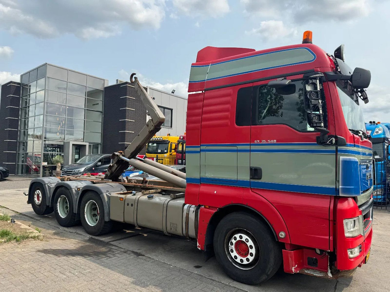 MAN TGX 35.540 - 8X4 - EURO 5 + AJK HOOK + LIFT/STEE - Camião polibenne: foto 3 MAN TGX 35.540 - 8X4 - EURO 5 + AJK HOOK + LIFT/STEE - Camião polibenne: foto 3