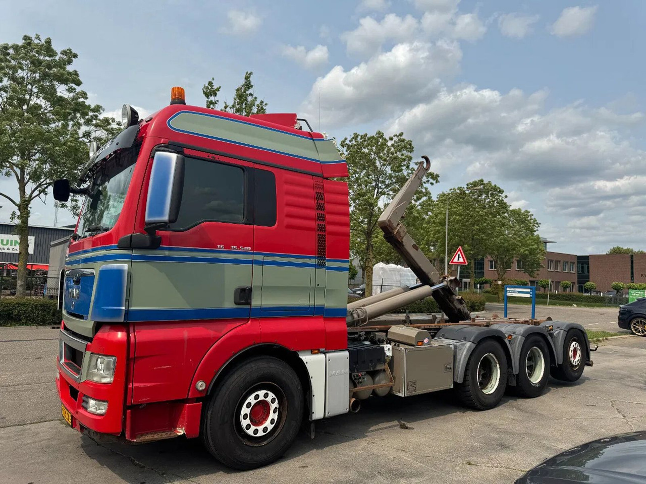 MAN TGX 35.540 - 8X4 - EURO 5 + AJK HOOK + LIFT/STEE - Camião polibenne: foto 1 MAN TGX 35.540 - 8X4 - EURO 5 + AJK HOOK + LIFT/STEE - Camião polibenne: foto 1