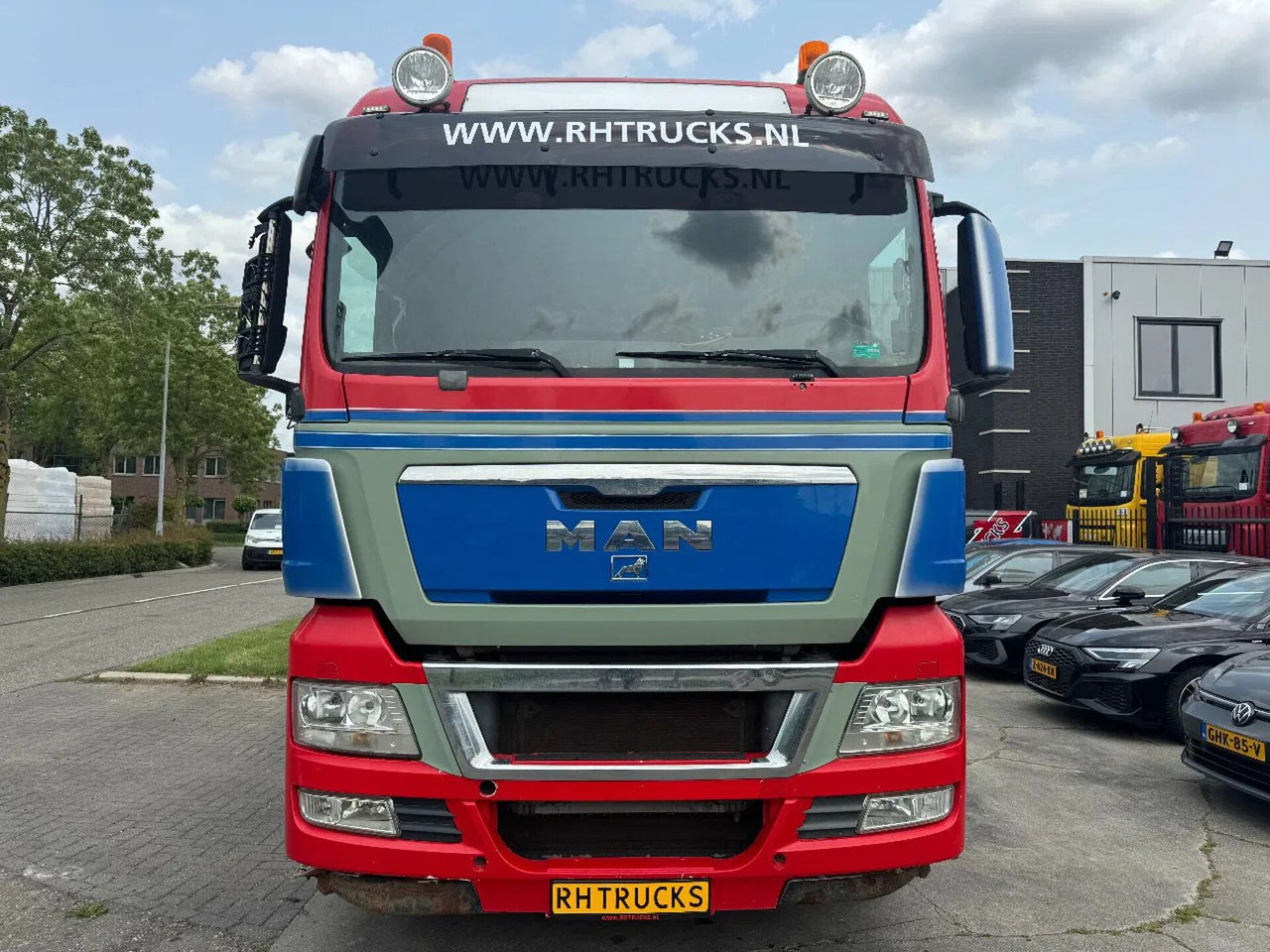 MAN TGX 35.540 - 8X4 - EURO 5 + AJK HOOK + LIFT/STEE - Camião polibenne: foto 2 MAN TGX 35.540 - 8X4 - EURO 5 + AJK HOOK + LIFT/STEE - Camião polibenne: foto 2