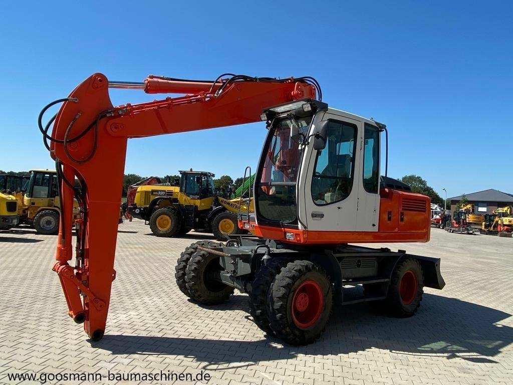 Liebherr A 900 C - Escavadeira de rodas: foto 1 Liebherr A 900 C - Escavadeira de rodas: foto 1