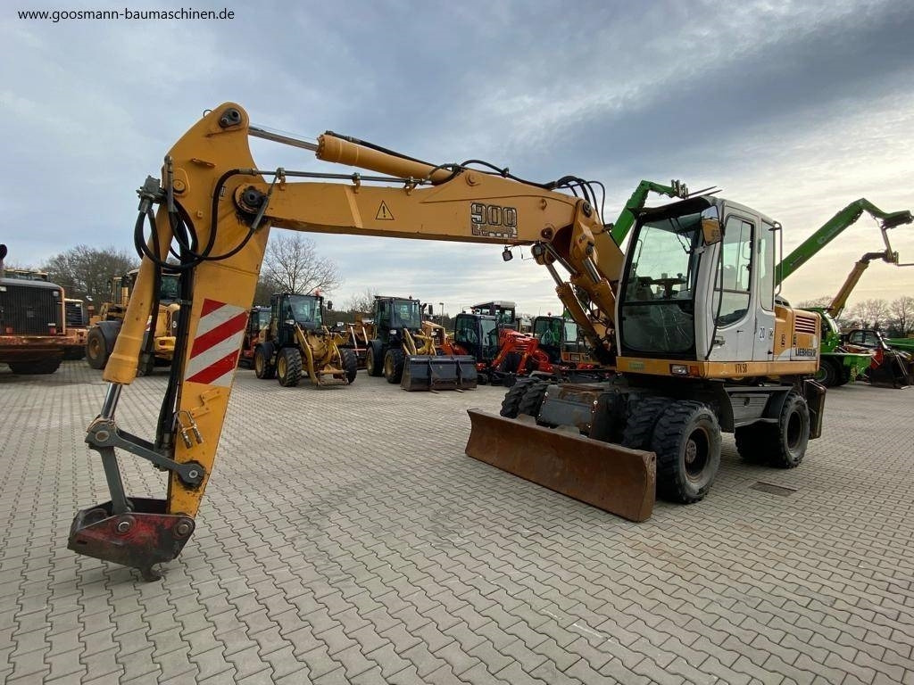 Liebherr A 900 C Litronic - Escavadeira de rodas: foto 1 Liebherr A 900 C Litronic - Escavadeira de rodas: foto 1