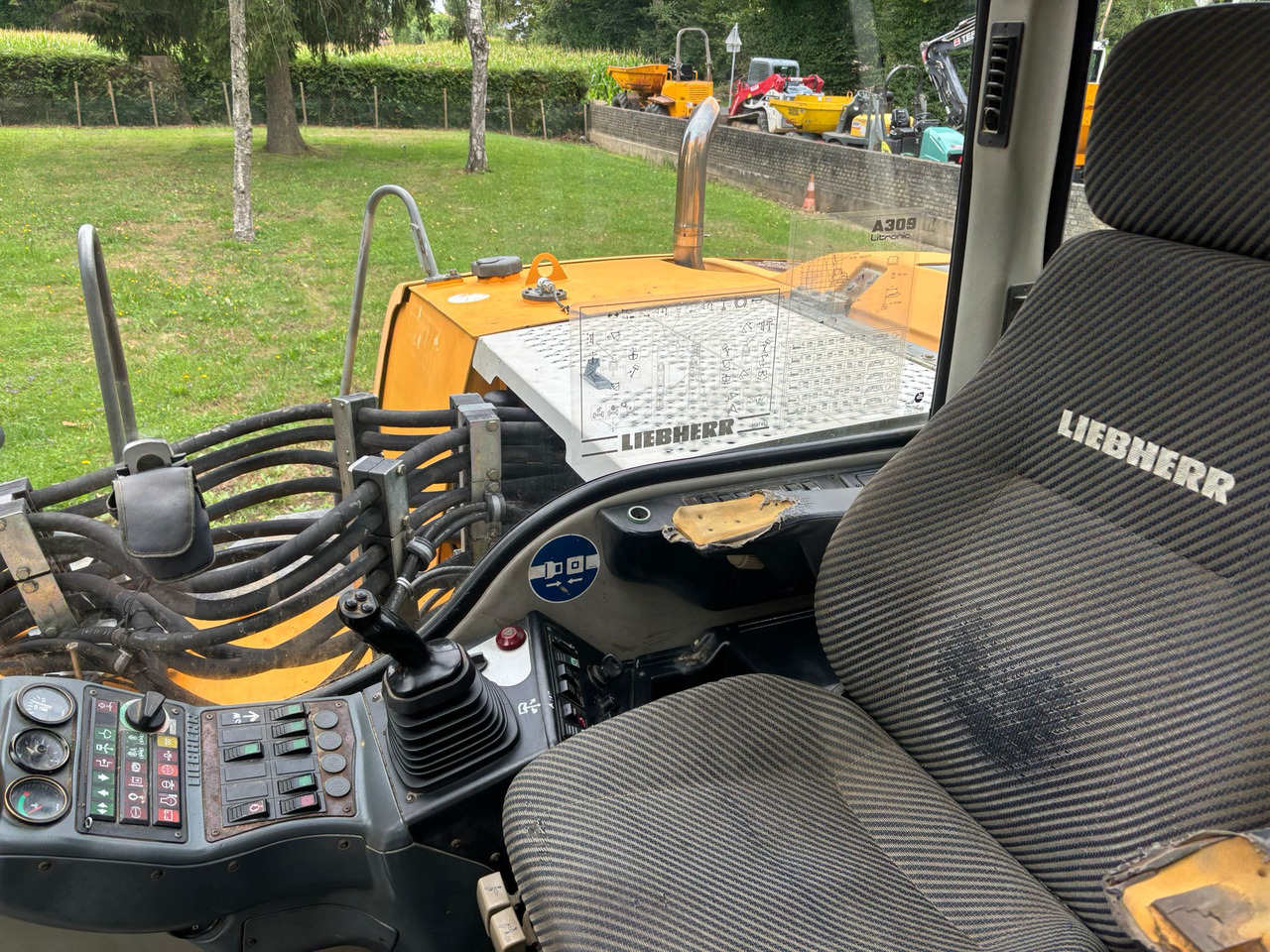 Escavadeira de rodas LIEBHERR A 309 Litronic: foto 10