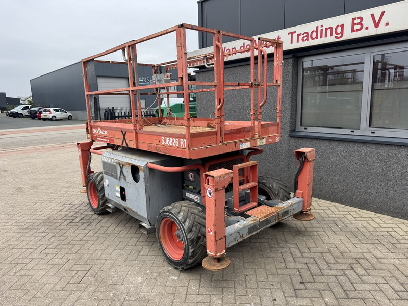 Skyjack SJ 6826RT Schaarhoogwerker / Scissor / Arbeitsbuhne 2015 4X4 Kubota Diesel 10M Werkhoogte - Plataforma de Tijera/ Plataforma de tesoura: foto 3 Skyjack SJ 6826RT Schaarhoogwerker / Scissor / Arbeitsbuhne 2015 4X4 Kubota Diesel 10M Werkhoogte - Plataforma de Tijera/ Plataforma de tesoura: foto 3