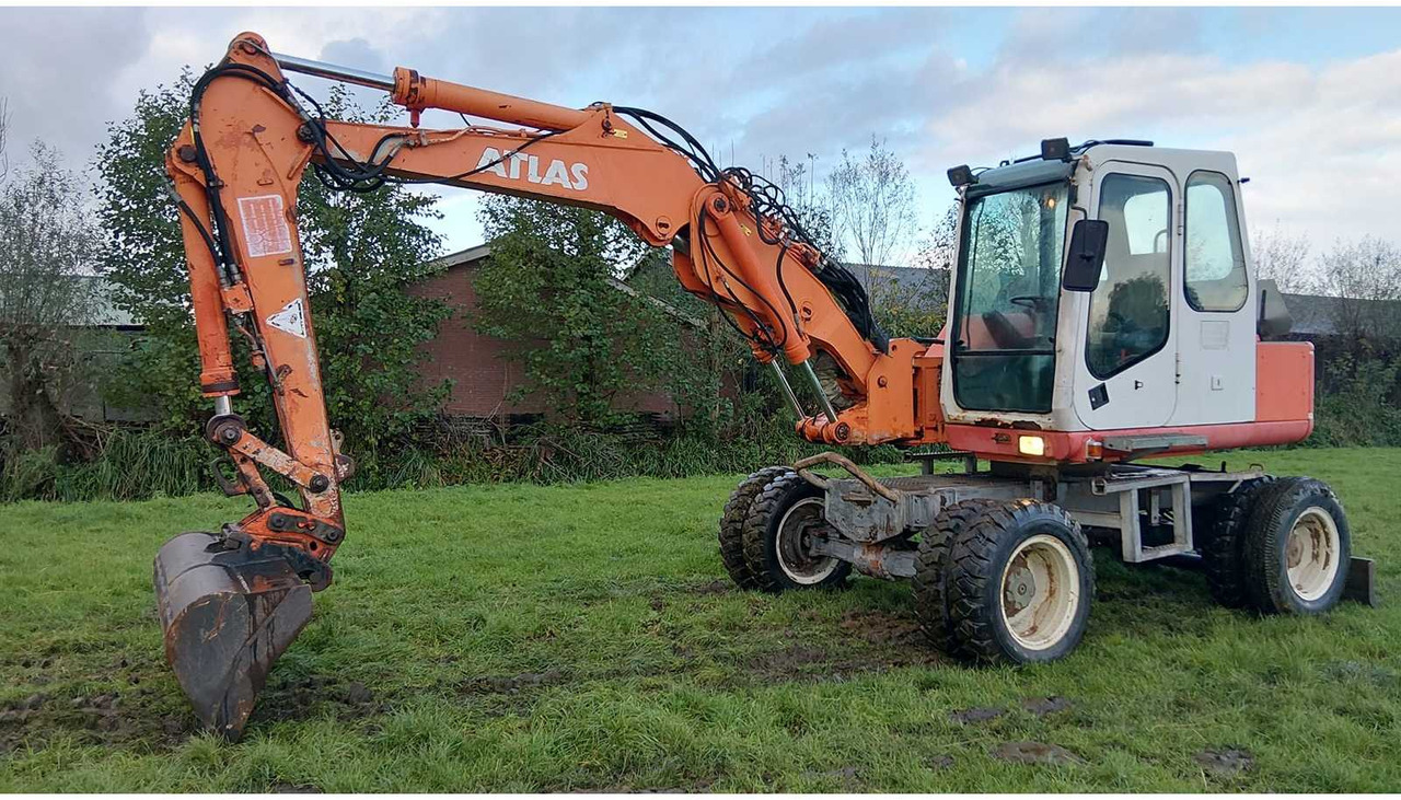 1996 ATLAS 1104 WHEELED EXCAVATOR - Escavadeira de rodas: foto 1 1996 ATLAS 1104 WHEELED EXCAVATOR - Escavadeira de rodas: foto 1