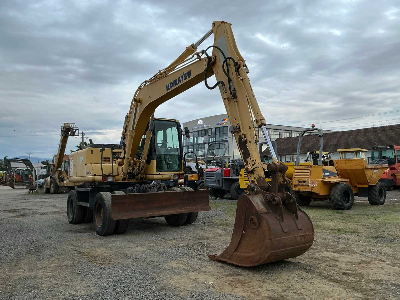 Komatsu PW 130 -7K - Escavadeira de rodas: foto 1 Komatsu PW 130 -7K - Escavadeira de rodas: foto 1