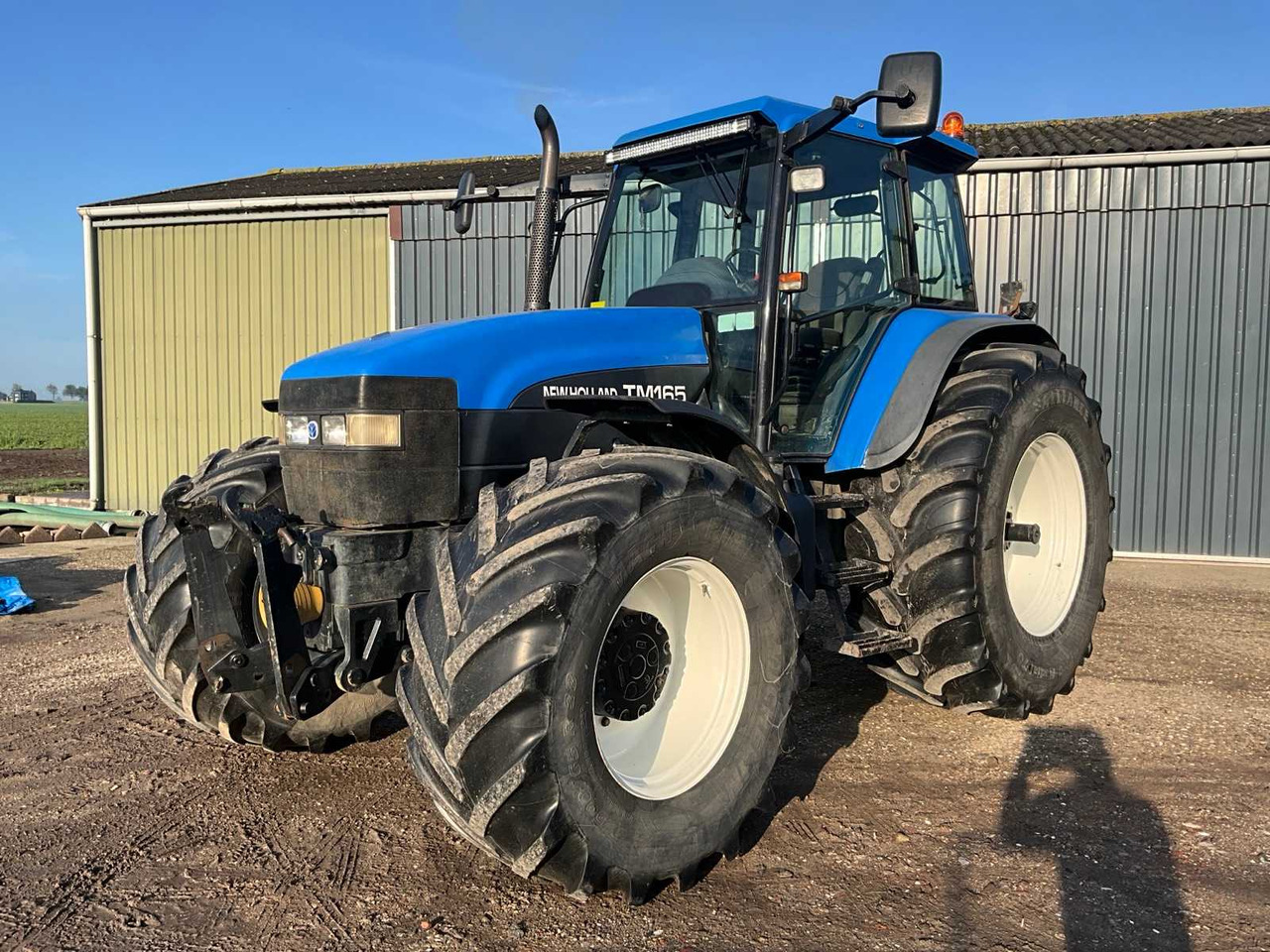 New Holland TM165 - Trator: foto 2 New Holland TM165 - Trator: foto 2