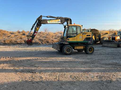 Volvo EXCAVATOR EW140D - Escavadeira de rodas: foto 2 Volvo EXCAVATOR EW140D - Escavadeira de rodas: foto 2