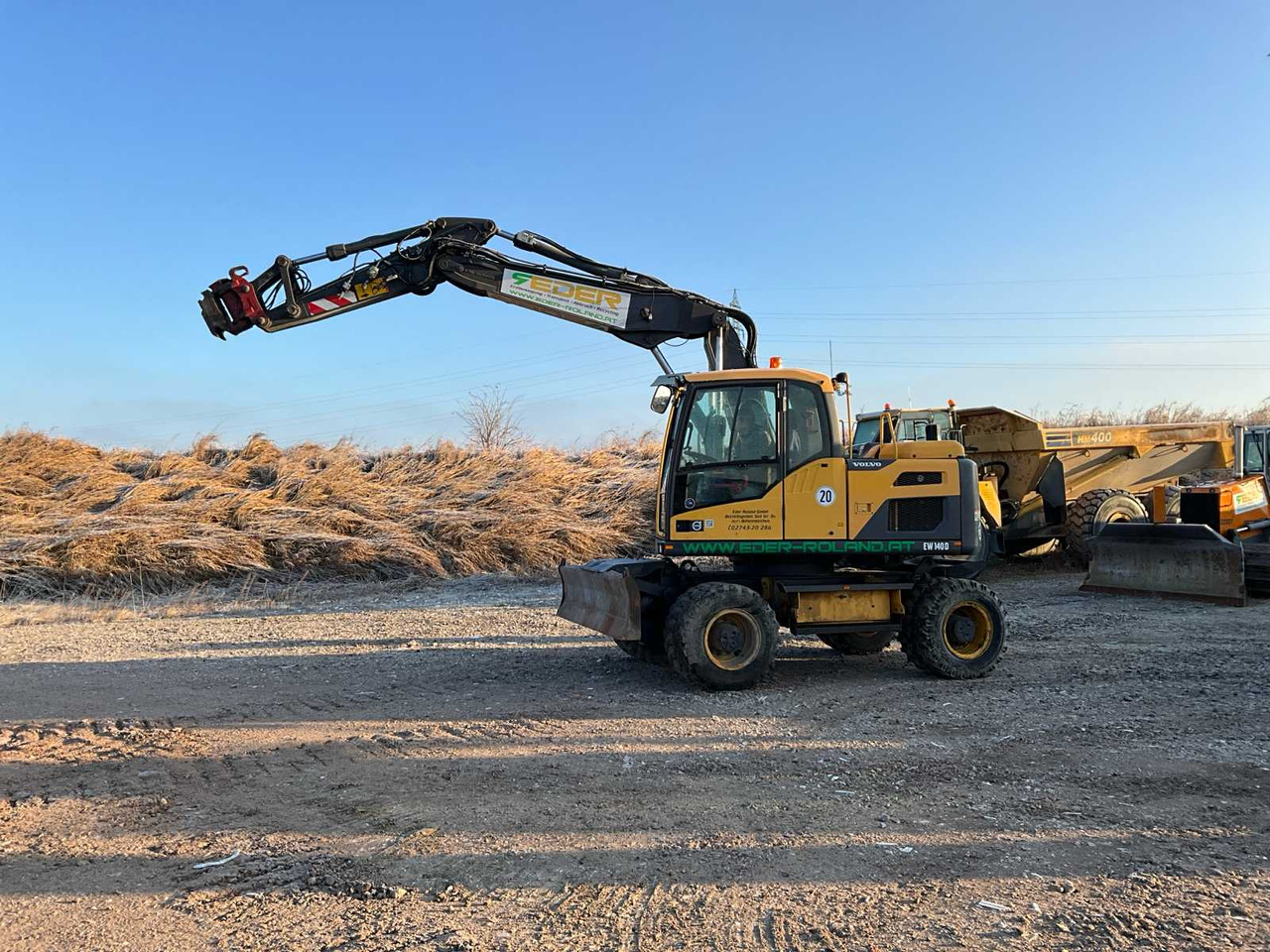 Volvo EXCAVATOR EW140D - Escavadeira de rodas: foto 1 Volvo EXCAVATOR EW140D - Escavadeira de rodas: foto 1