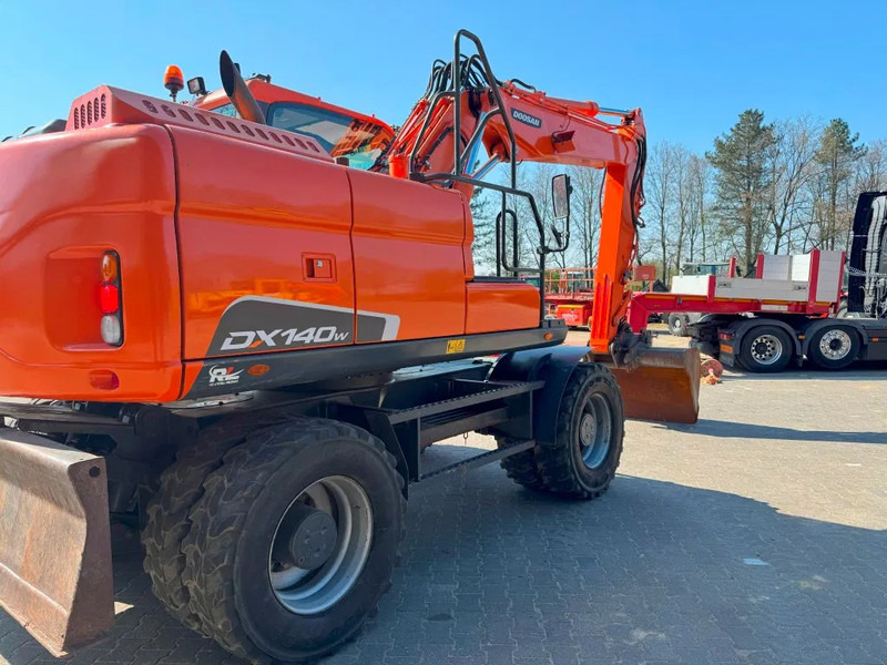 Doosan DX140-3 6000 uur ! NL Machine - Escavadeira de rodas: foto 4 Doosan DX140-3 6000 uur ! NL Machine - Escavadeira de rodas: foto 4