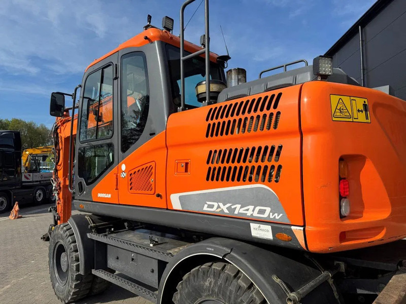 Doosan DX140-5 2018 - Escavadeira de rodas: foto 4 Doosan DX140-5 2018 - Escavadeira de rodas: foto 4