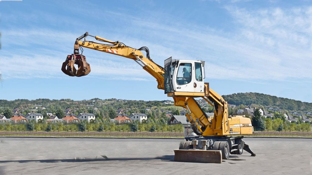 Liebherr PELLE A316 * Umschlagbagger * Topzustand! - Escavadeira de rodas: foto 1 Liebherr PELLE A316 * Umschlagbagger * Topzustand! - Escavadeira de rodas: foto 1