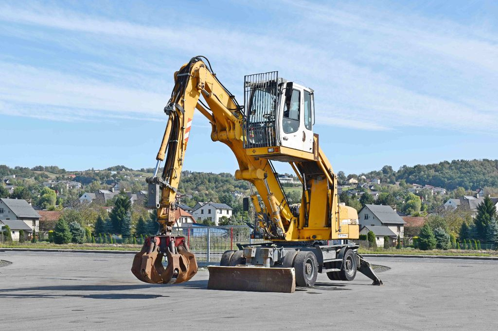 Liebherr PELLE A316 * Umschlagbagger * Topzustand! - Escavadeira de rodas: foto 2 Liebherr PELLE A316 * Umschlagbagger * Topzustand! - Escavadeira de rodas: foto 2