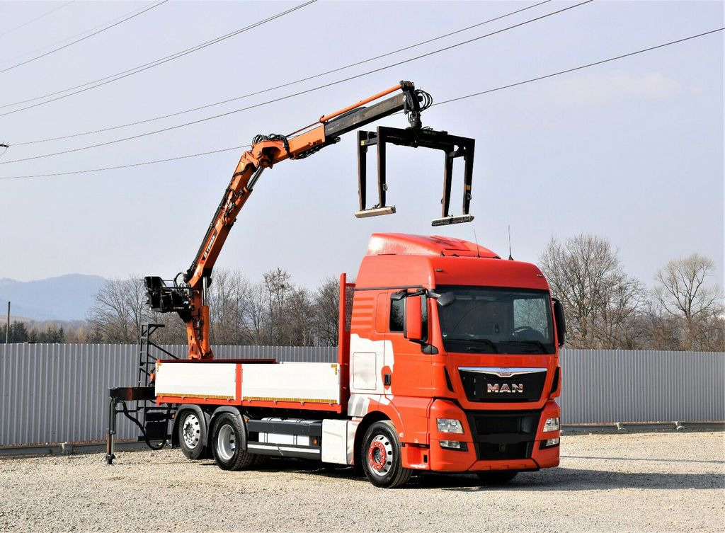 MAN TGX 26.440 Pritsche 6,60 m*TEREX 135.2-A11 - Camião grua: foto 1 MAN TGX 26.440 Pritsche 6,60 m*TEREX 135.2-A11 - Camião grua: foto 1