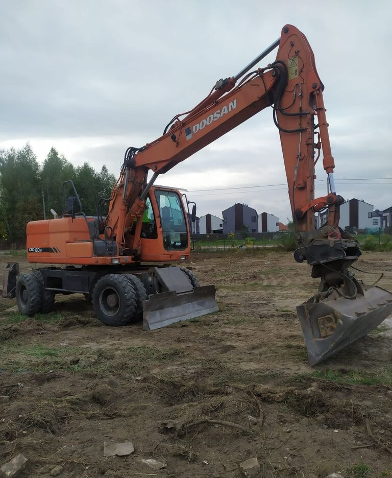 Doosan DX160 w - Escavadeira de rodas: foto 4 Doosan DX160 w - Escavadeira de rodas: foto 4