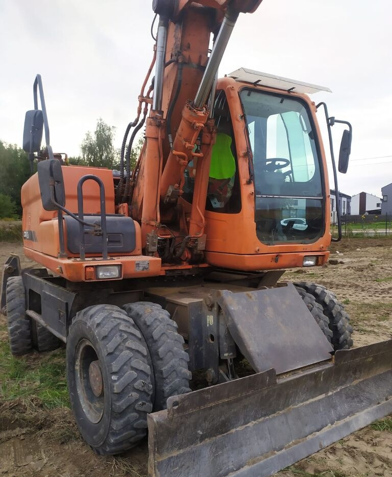 Doosan DX160 w - Escavadeira de rodas: foto 3 Doosan DX160 w - Escavadeira de rodas: foto 3