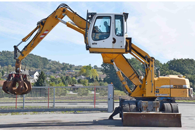 Escavadeira de rodas Liebherr PELLE A316: foto 7