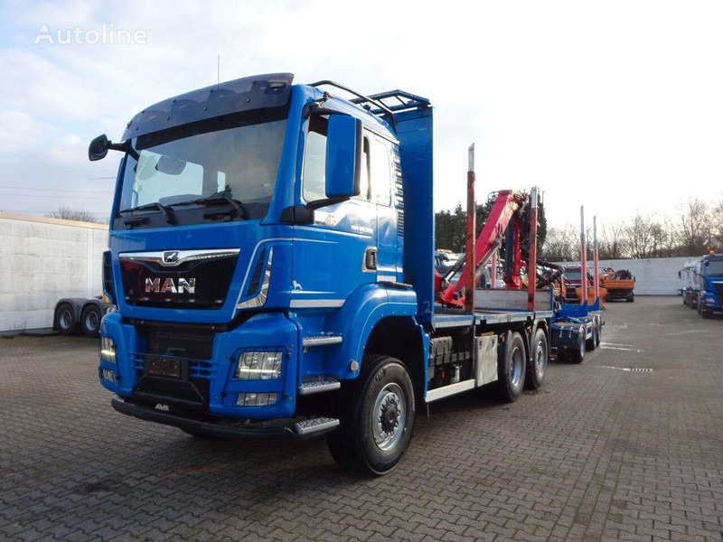 MAN TGS 28.500 6x4 Log truck + Crane Epsilon + Trailer - Camião de transporte de madeira, Camião grua: foto 1 MAN TGS 28.500 6x4 Log truck + Crane Epsilon + Trailer - Camião de transporte de madeira, Camião grua: foto 1