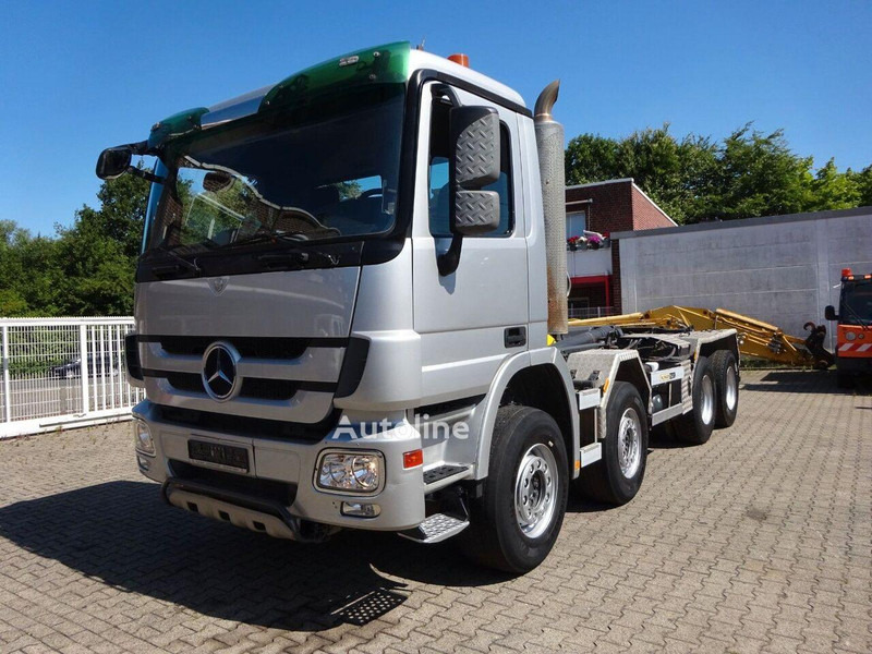 Mercedes-Benz Actros 3244 - Hook lift truck 8x4 - Camião polibenne, Camião grua: foto 1 Mercedes-Benz Actros 3244 - Hook lift truck 8x4 - Camião polibenne, Camião grua: foto 1
