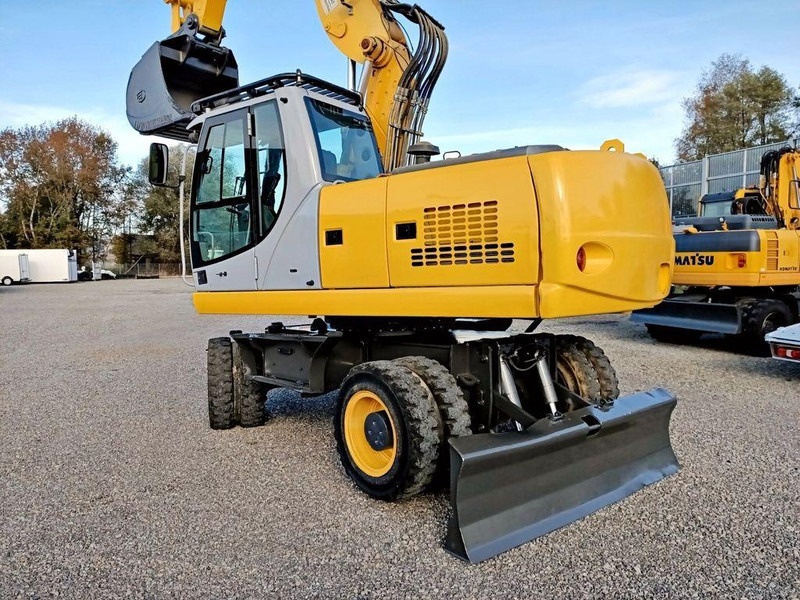 New Holland WE 190 - Escavadeira de rodas: foto 3 New Holland WE 190 - Escavadeira de rodas: foto 3