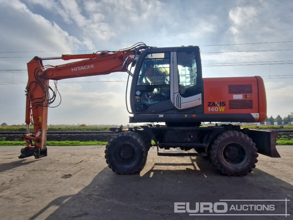 Hitachi ZX140W-3 - Escavadeira de rodas: foto 2 Hitachi ZX140W-3 - Escavadeira de rodas: foto 2