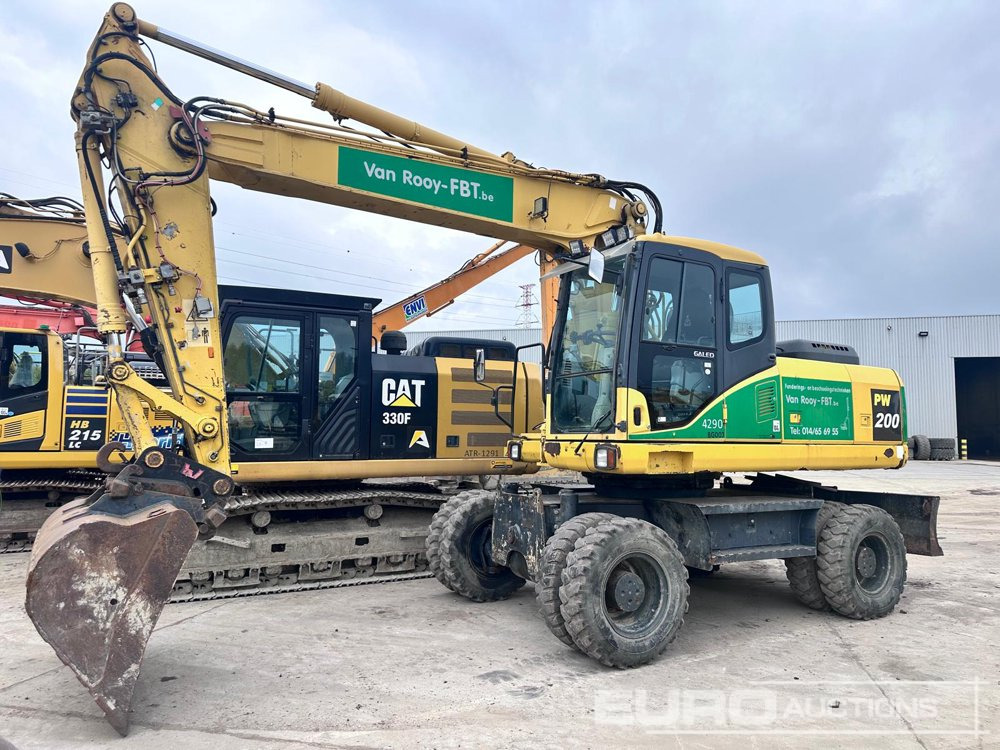 Komatsu PW200-7H - Escavadeira de rodas: foto 1 Komatsu PW200-7H - Escavadeira de rodas: foto 1