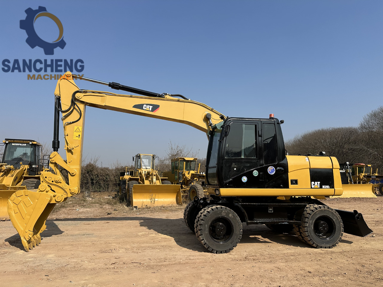 CATERPILLAR M320D2 - Escavadeira de rodas: foto 5 CATERPILLAR M320D2 - Escavadeira de rodas: foto 5